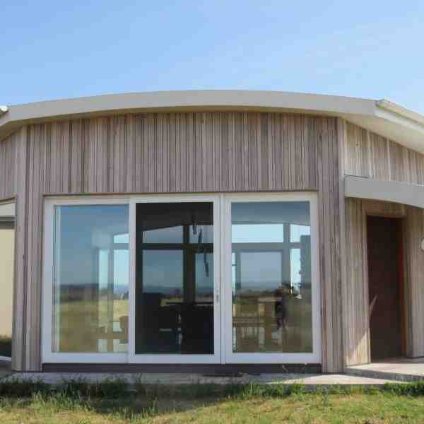 Pre aged grey vertical cladding